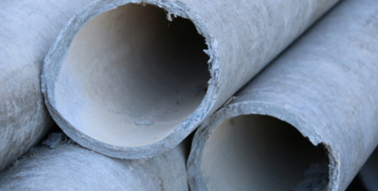 Canonades de fibrociment; material que conté amiant/ ACN