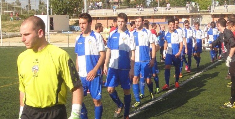 Bofill, darrere Lluri Granado, en el passadís del Sabadell Nord al filial l'any 2013 | ArxiuRS946